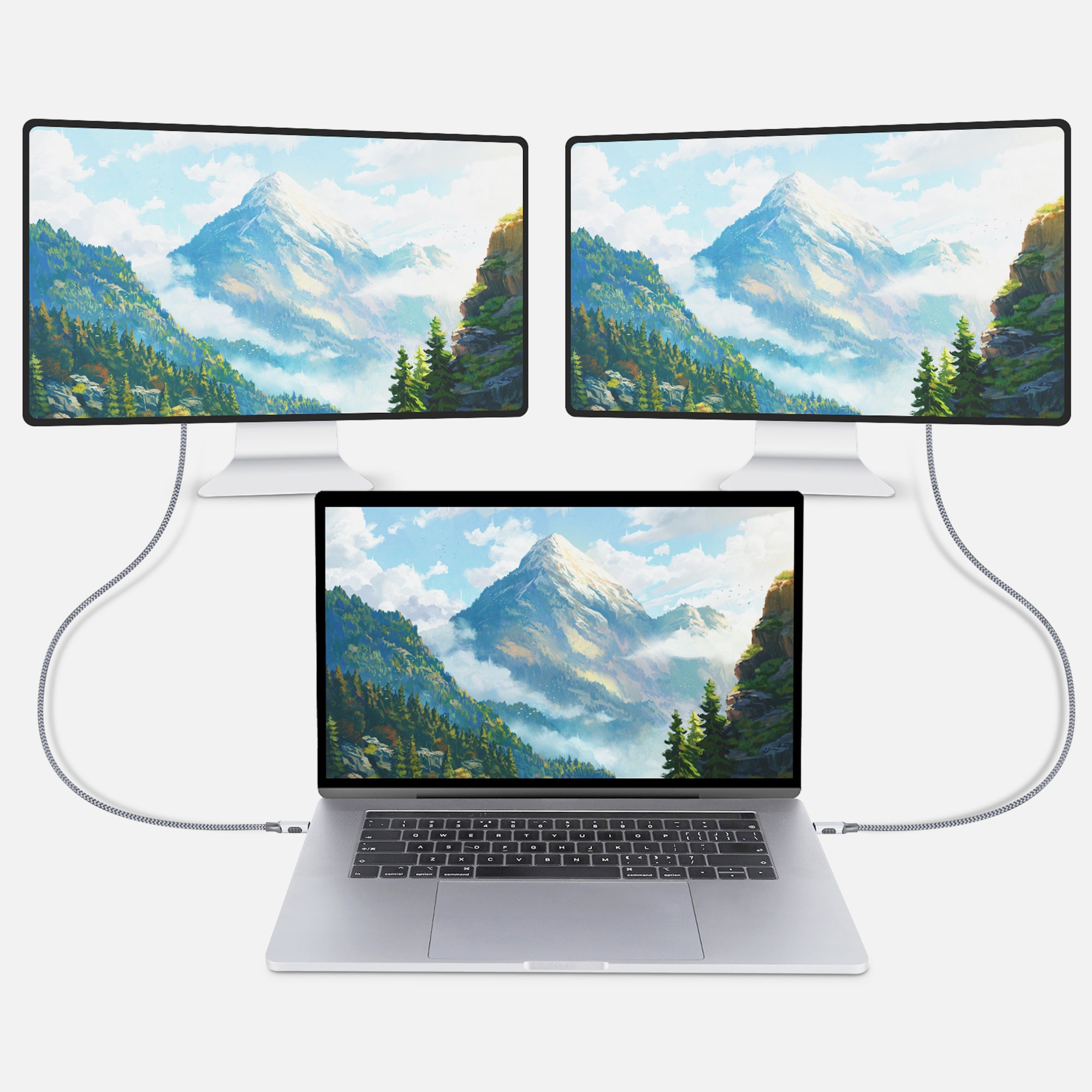 Two HDMI adapter cables plugged into MacBook Pro going to two external monitors