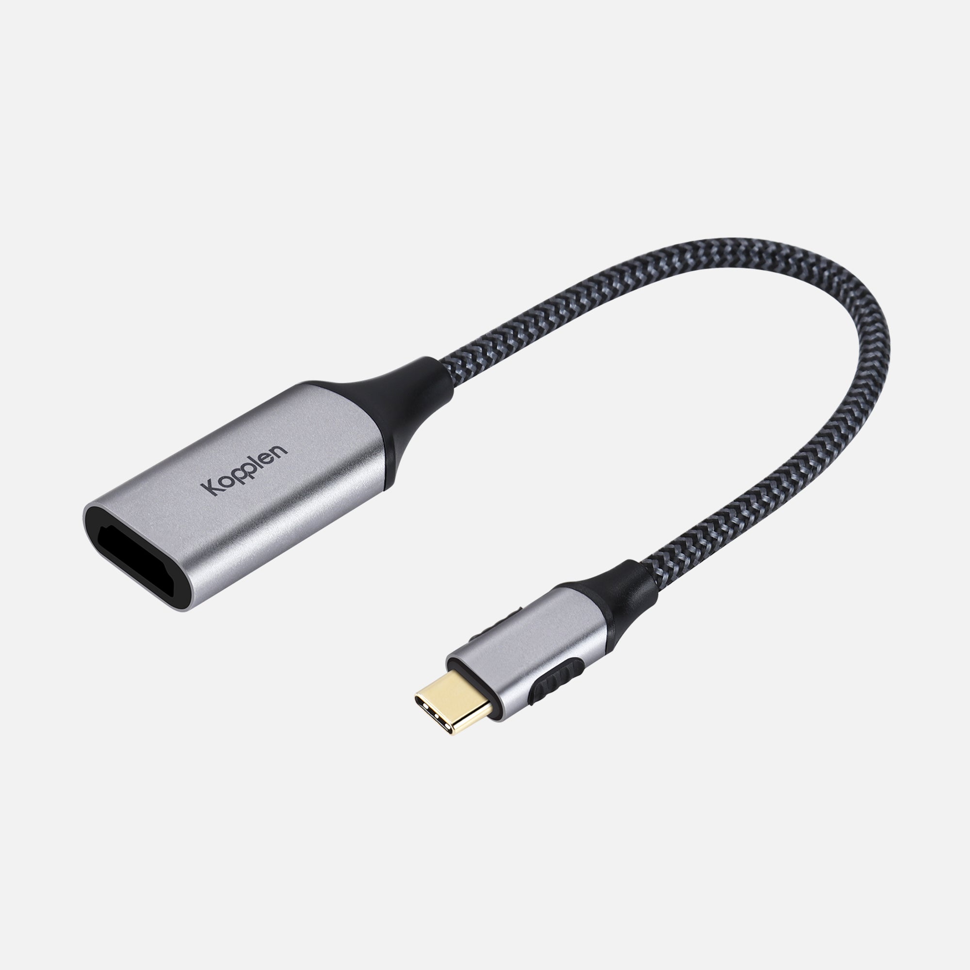 HDMI adapter cable laying flat showing USB-C connector and female HDMI connector