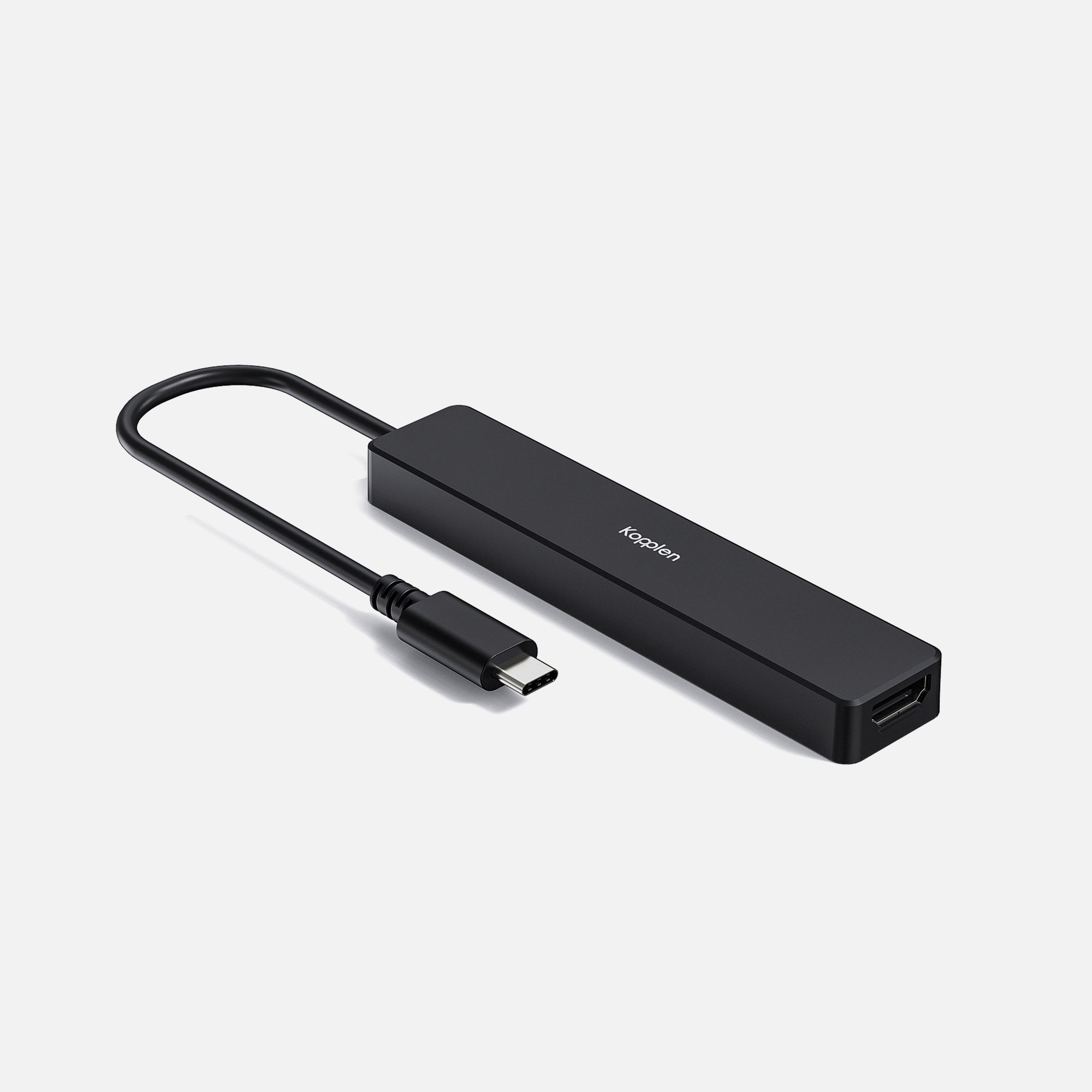 USB-C hub on table, with Kopplen on top side of hub