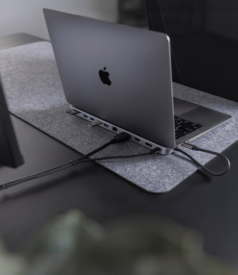 Docking station laptop stand for MacBook pro on desk