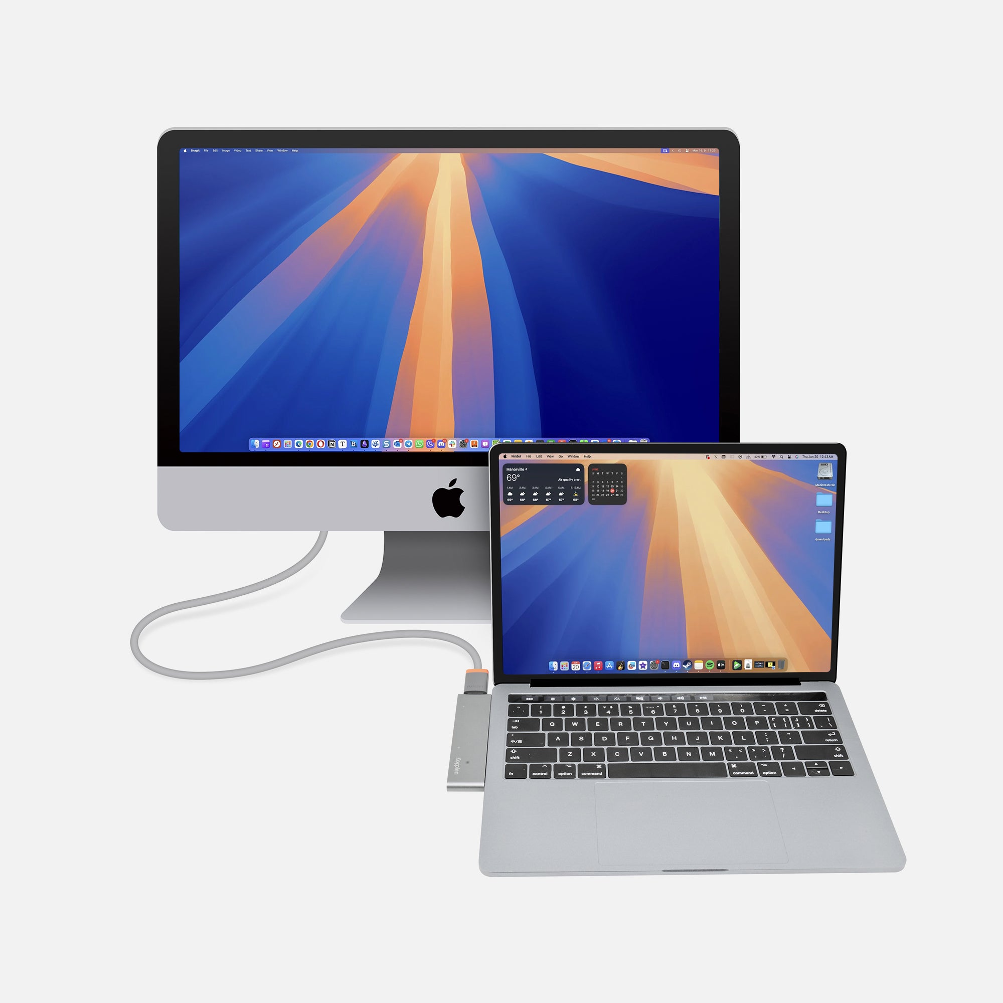 Hug plugged into MacBook with HDMI cable leading to external monitor