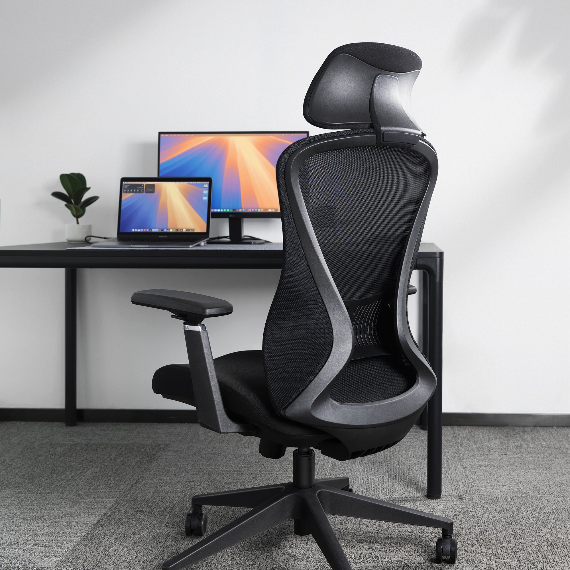 back of pinnacle office chair and desk setup