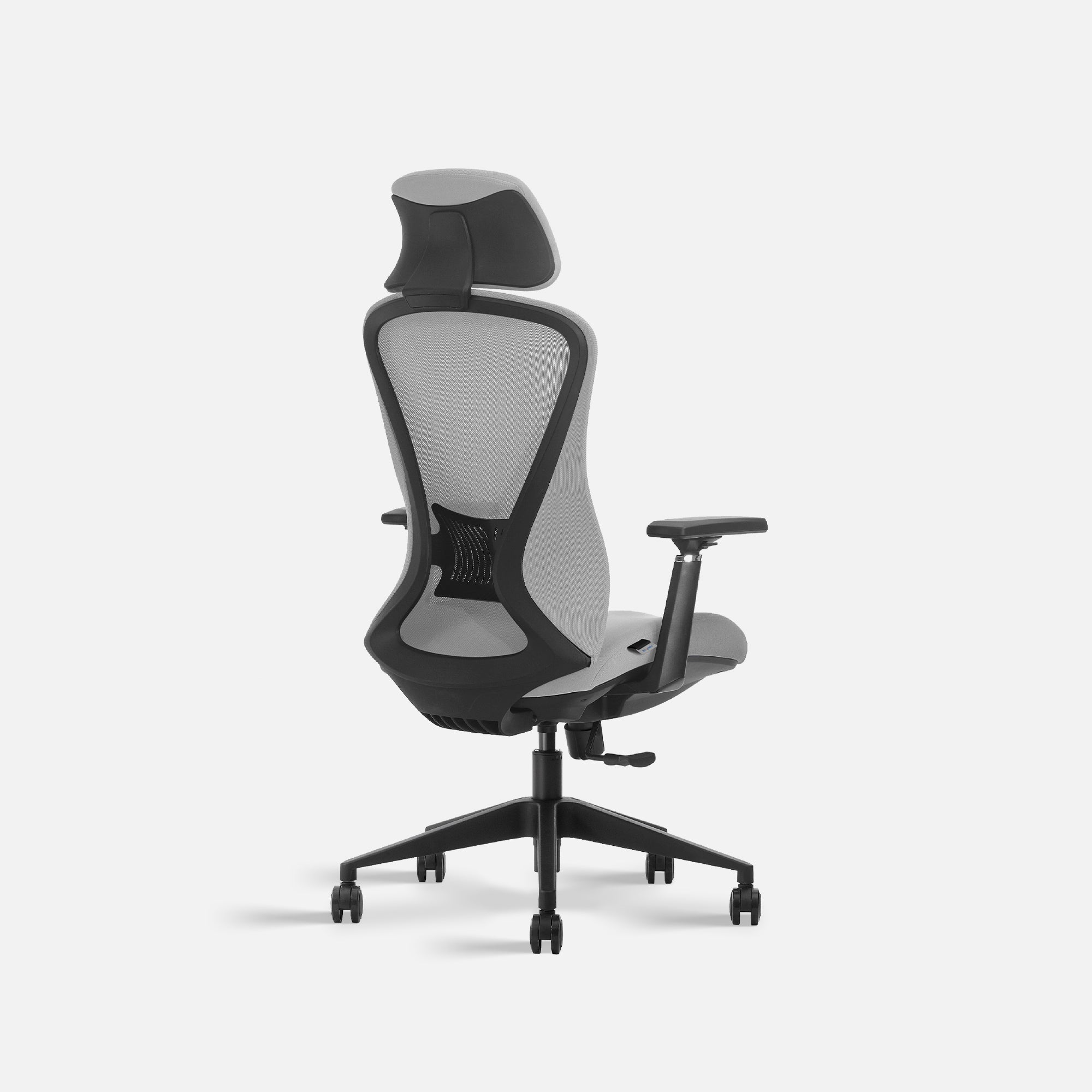 Rear quarter view of grey chair