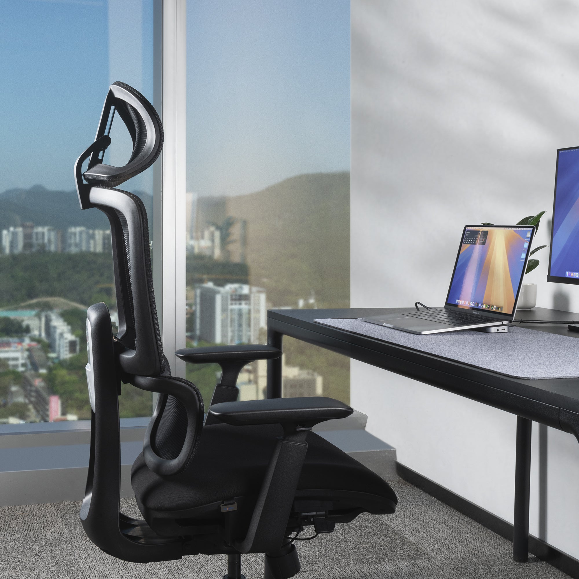 Nucleus office chair at desk in office