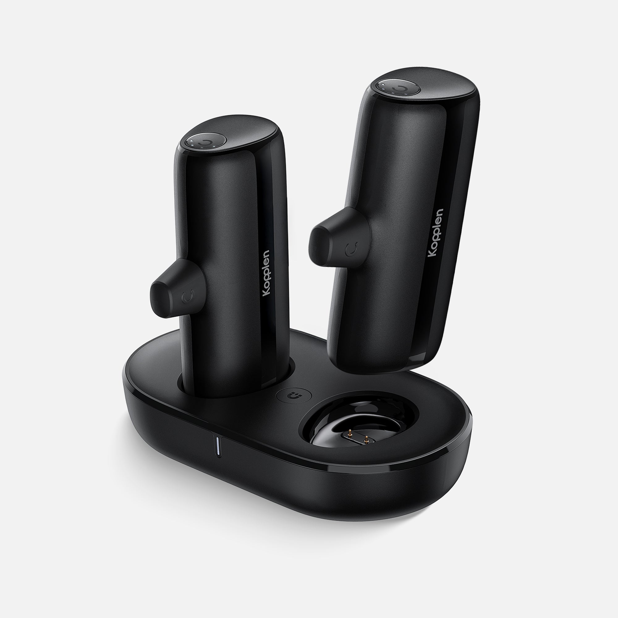 Pair of grab and go power banks with one power bank raised out of charging station dock