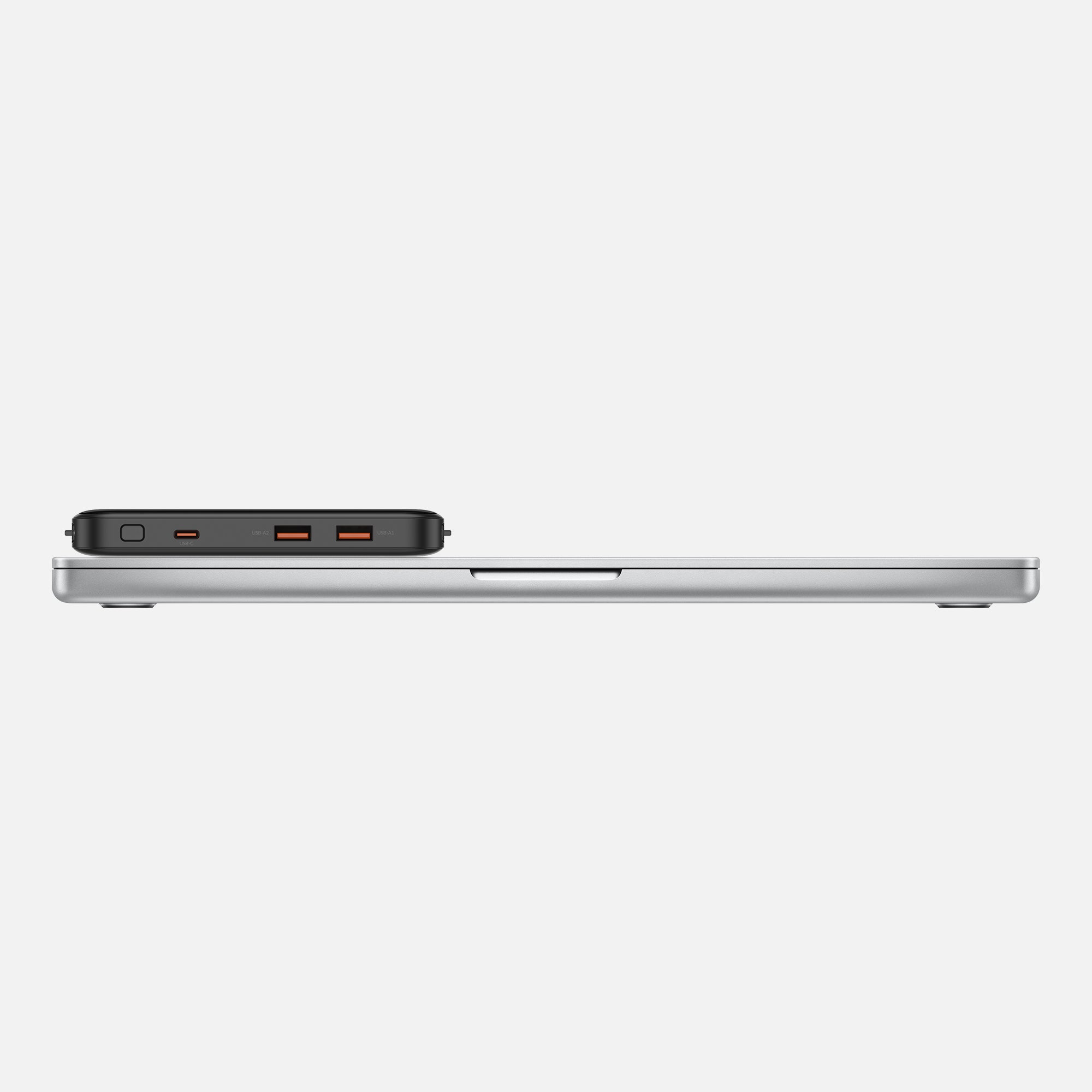 Power bank on top of laptop