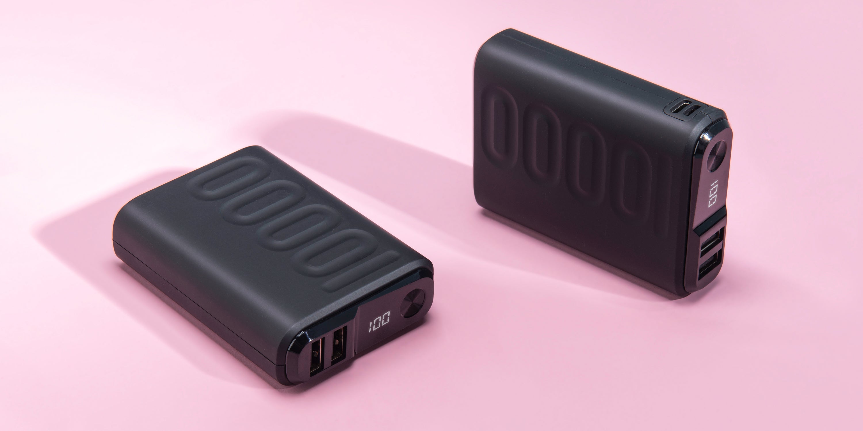 power banks on pink background