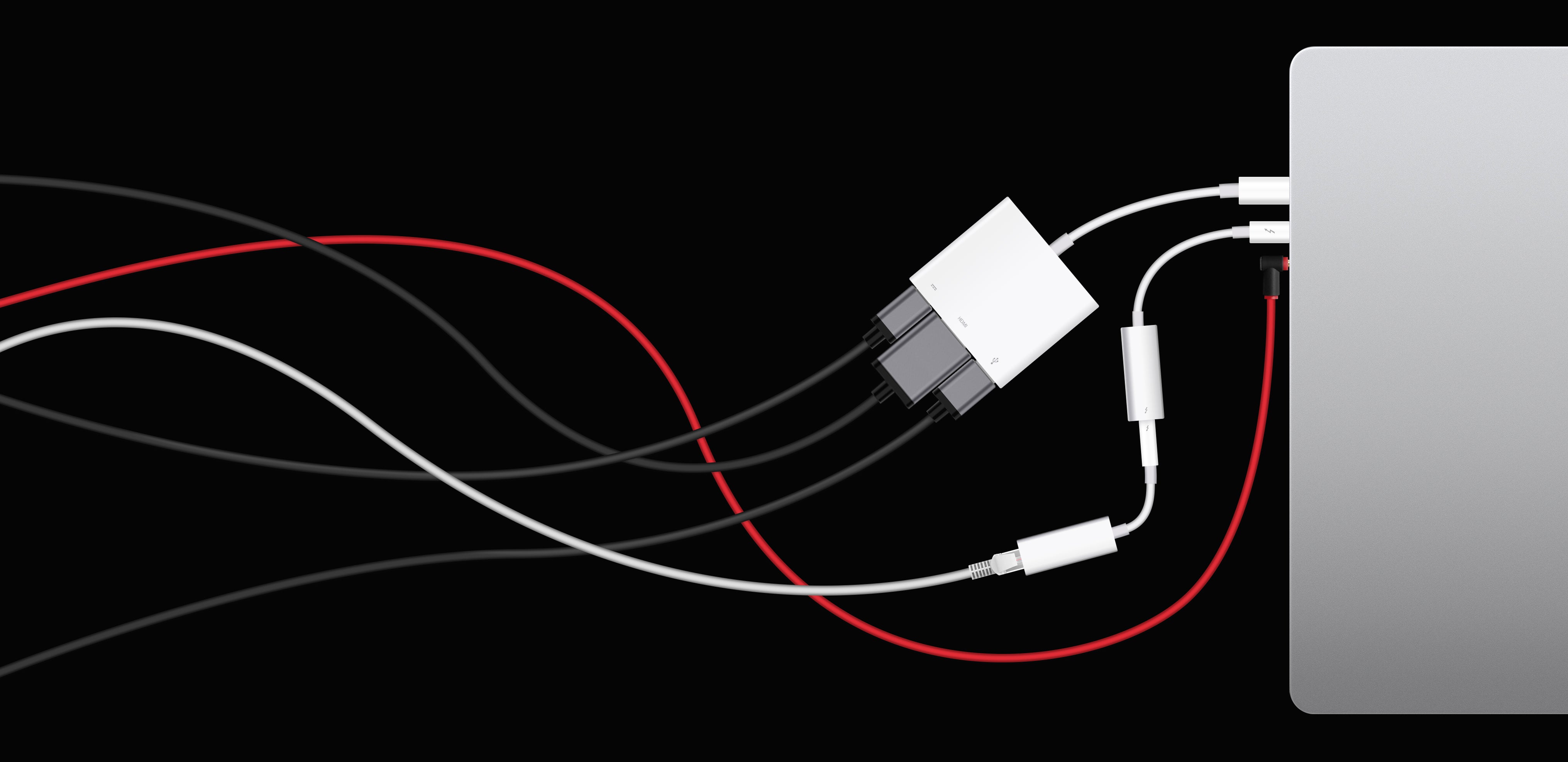 Messy cables plugged into laptop